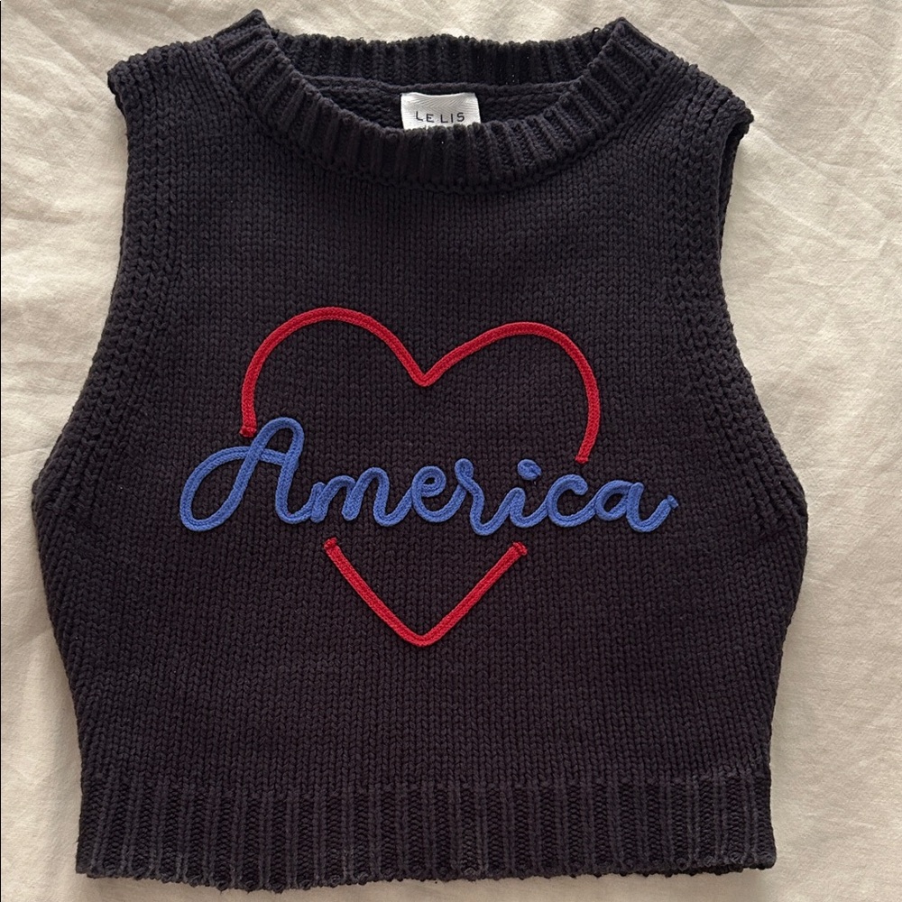 Le Lis Black Sleeveless Sweater with Red Heart and Blue Script